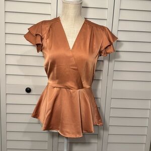 NWOT Satin Monteau Pemplum top